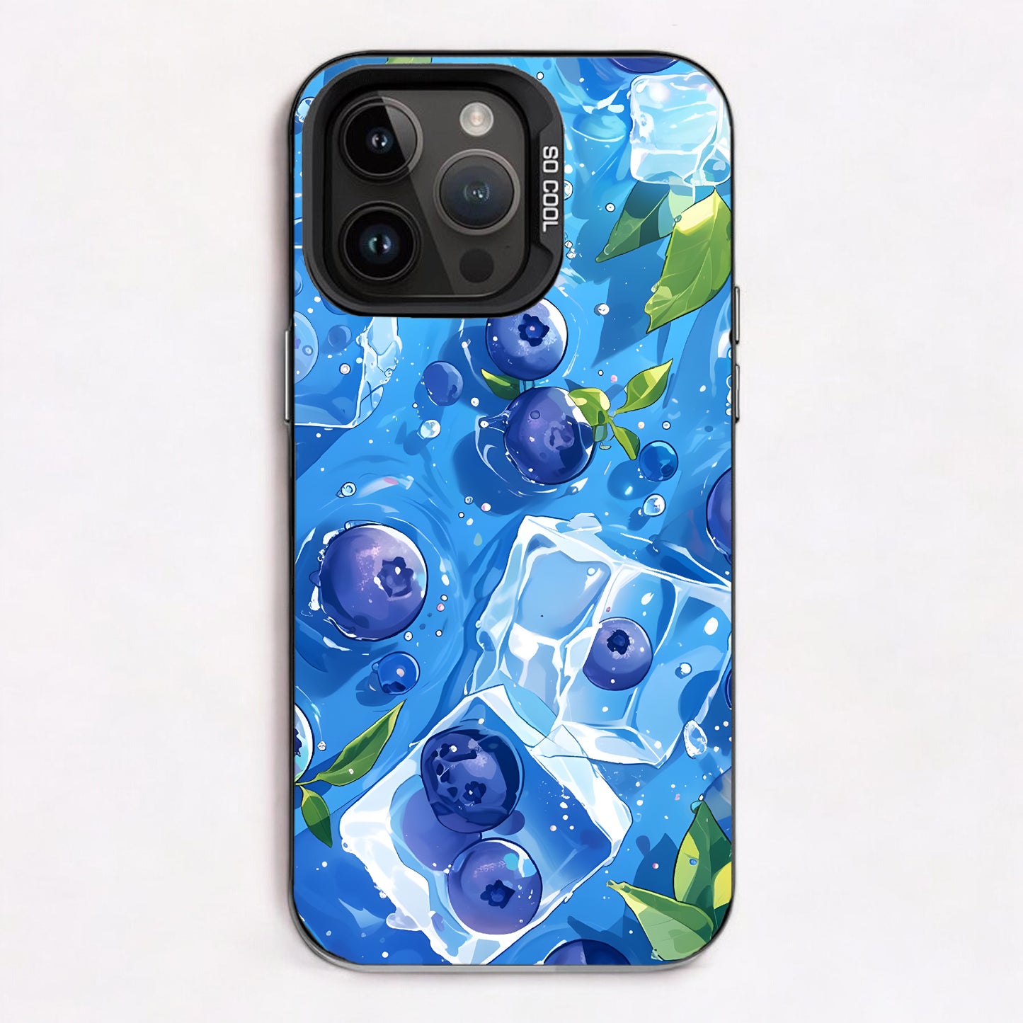 Vibrant blueberries and ice cubes with green leaves on a cool blue background.
