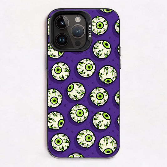 Repeating pattern of cartoon eyes with green irises and wavy lines on a purple background.