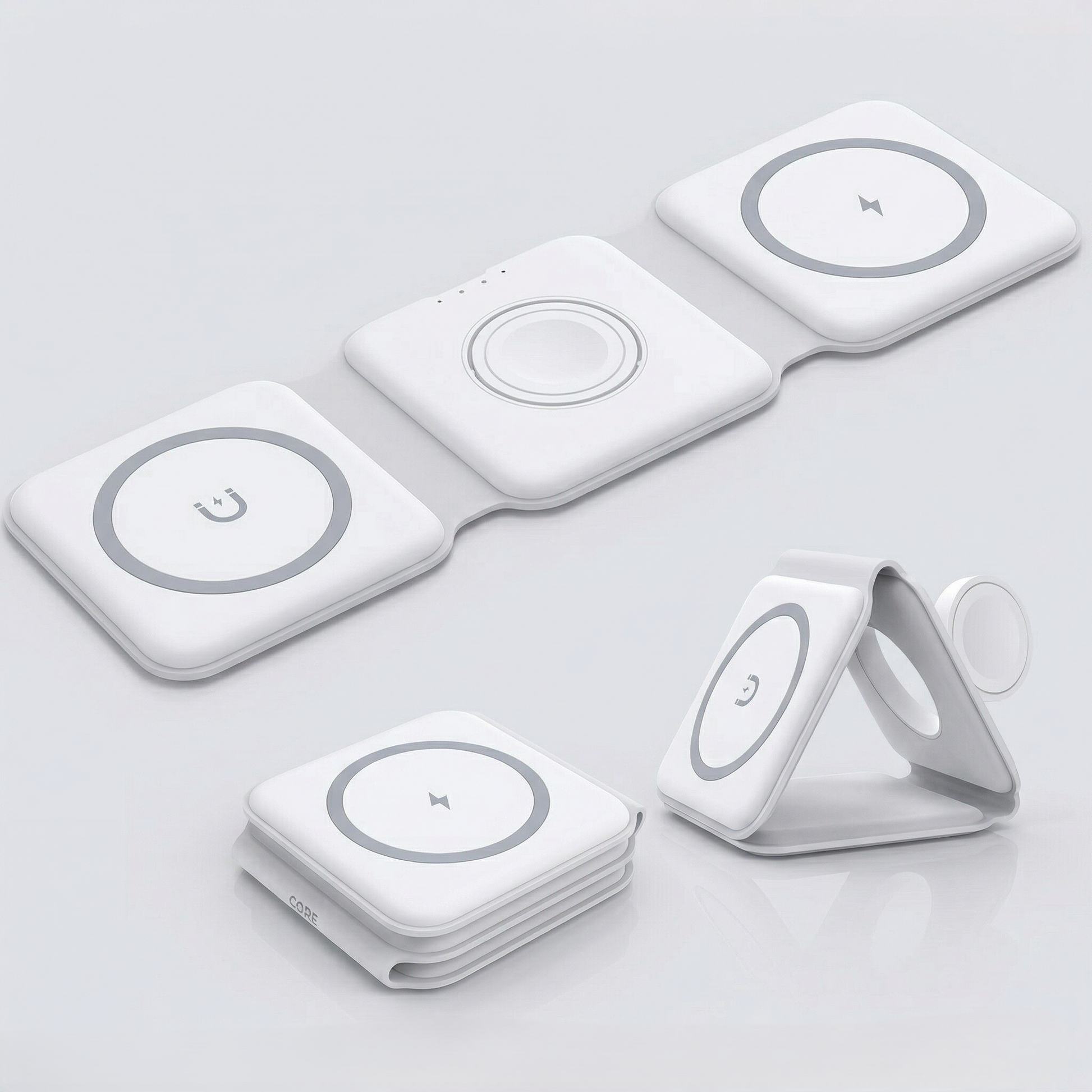 Set of white wireless charging pads on a light gray background