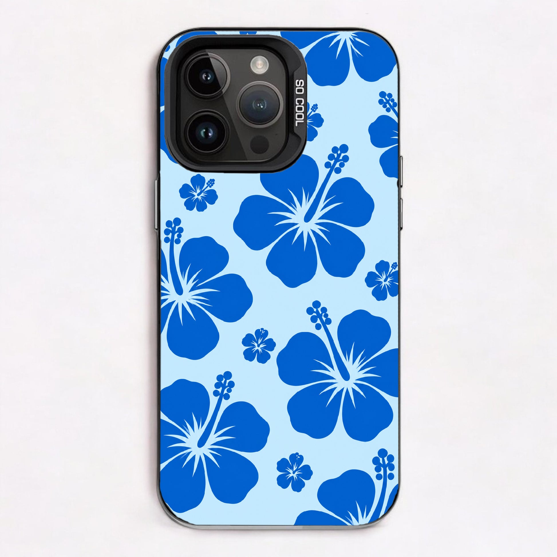 Vibrant blue hibiscus flowers on a light blue background in a repeating pattern.
