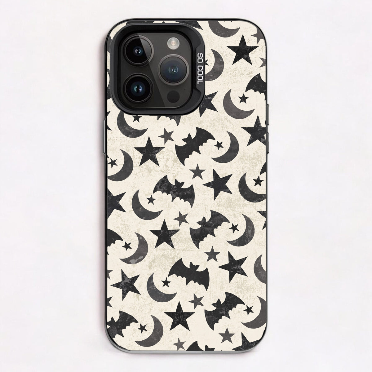 Repeating pattern of black bats, crescent moons, and stars on a bone-white background.