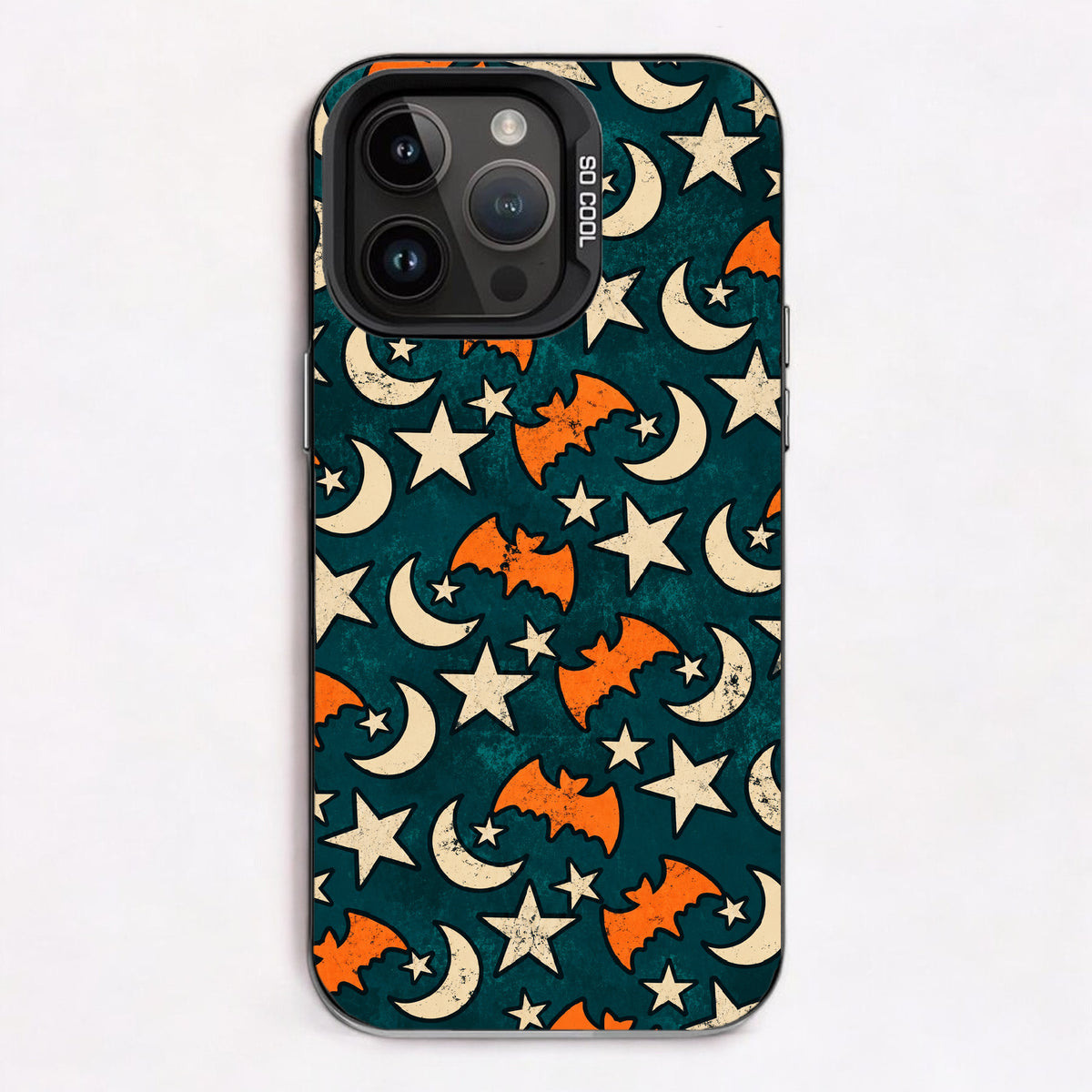 Repeating pattern of orange bats, white stars, and cream crescent moons on a teal background.