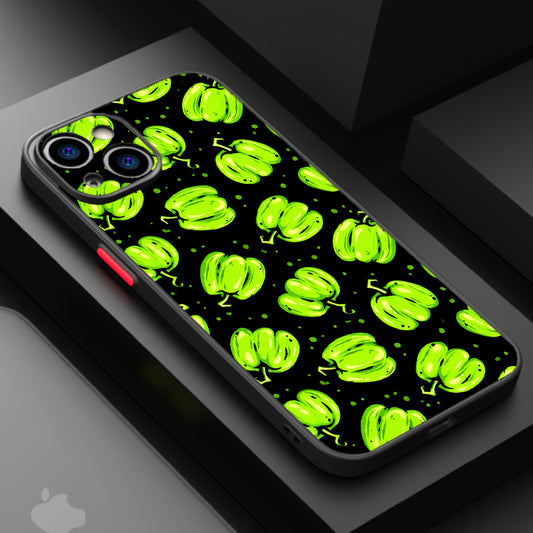 Repeating pattern of glowing green pumpkins on a black background.