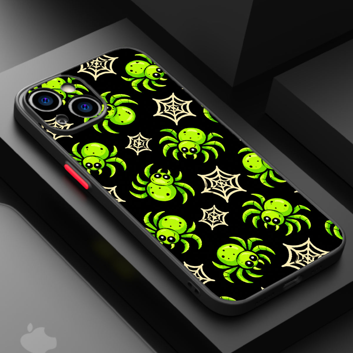 A black background with glowing green spiders and spider webs in a playful, cartoonish style.